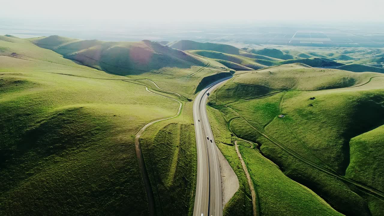 Golden Hour Over Rolling Green Hills, Serene Road Near San Francisco, California