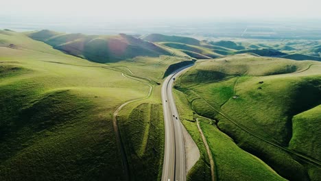 golden hour over rolling green hills, serene road near san francisco, california