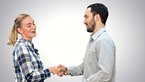 people meet and shake hands on white background