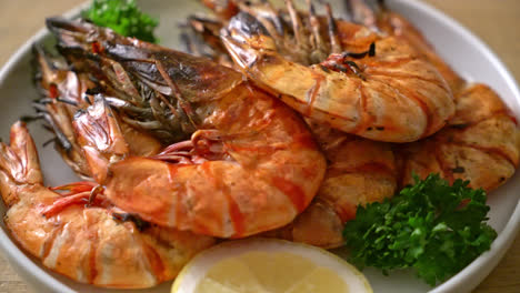 grilled tiger prawns or shrimps with lemon