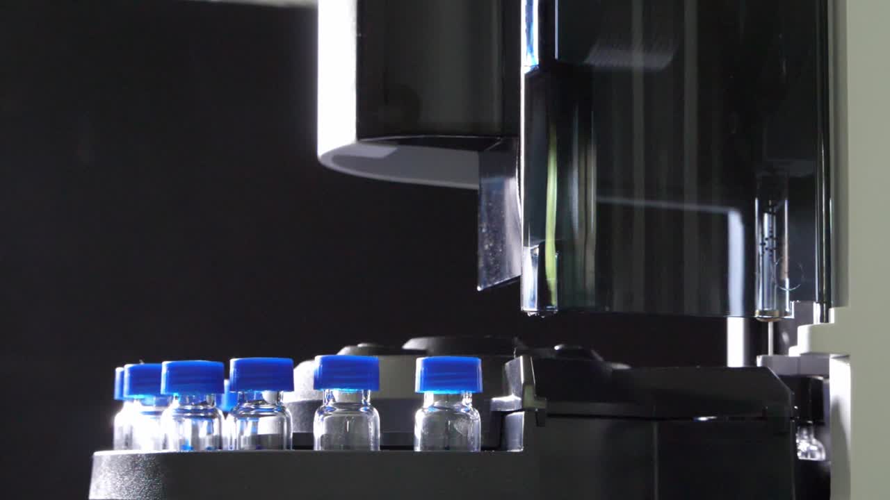 Medicine research in medical laboratory, process of vaccine development, automatically machine do an experiment on sample in science lab