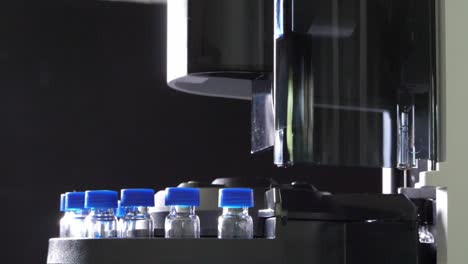 medicine research in medical laboratory, process of vaccine development, automatically machine do an experiment on sample in science lab