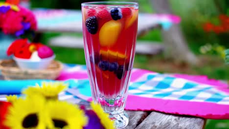 refreshing fruit cocktail in a garden setting