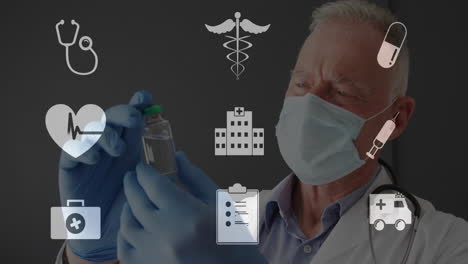 animation of medical icons over caucasian male doctor in face mask