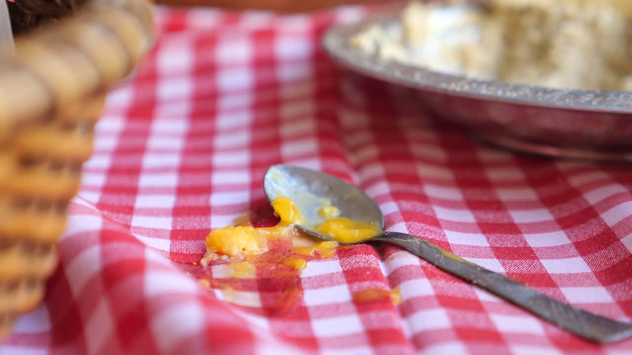 Pie and Sauce Spill on a Checkered Tablecloth