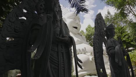 happy buddah statuein garden vietnam da lat