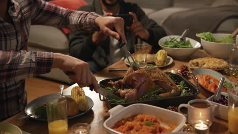 millennial adult friends celebrating thanksgiving together at home