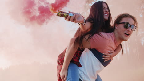 loving couples playing with smoke bombs