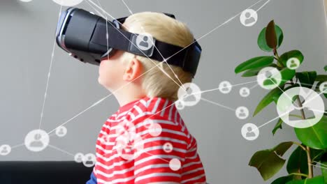 animation of network of connections with icons over girl wearing vr headset