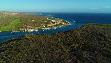 Aerial-drone-wide-angle-above-barbara-beach-and-sandals-resort-curacao-at-sunset