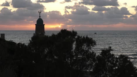 minaret dome and sea view at sunset