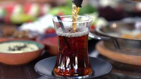 turkish breakfast on the table in restaurant. camera moves above the table.