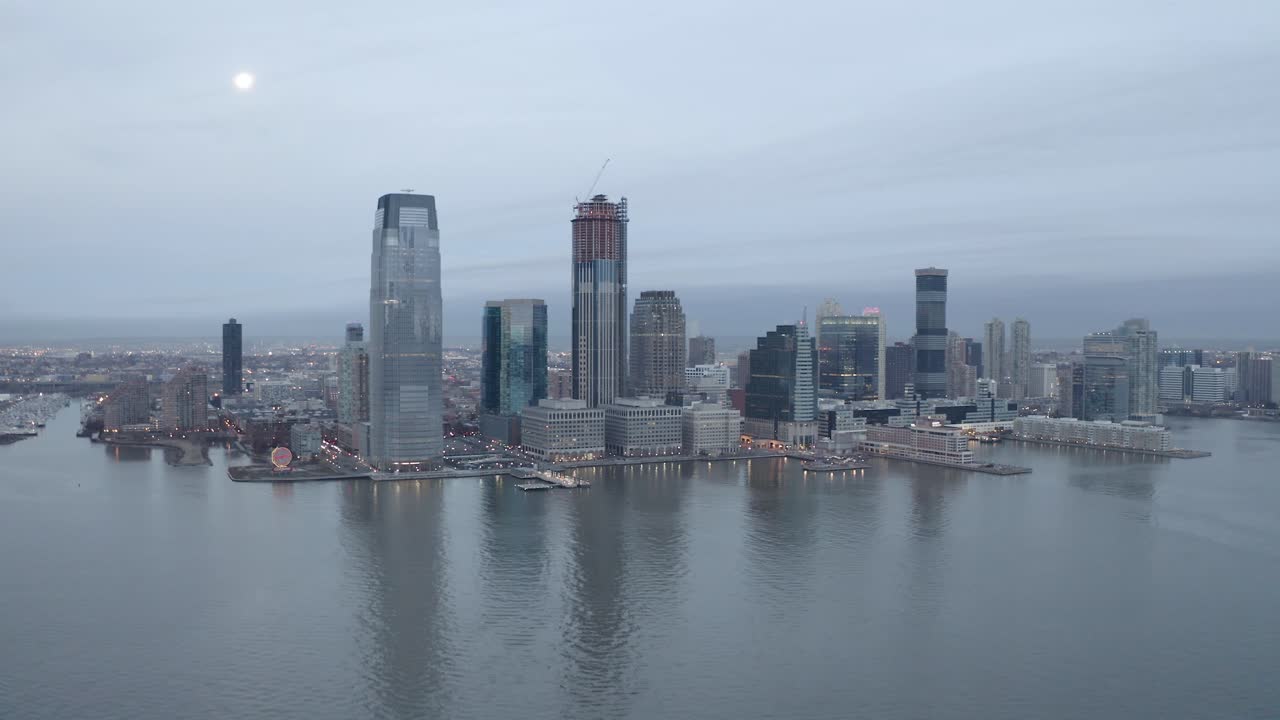 Aerial footage of lower Manhattan; taken from Jersey City