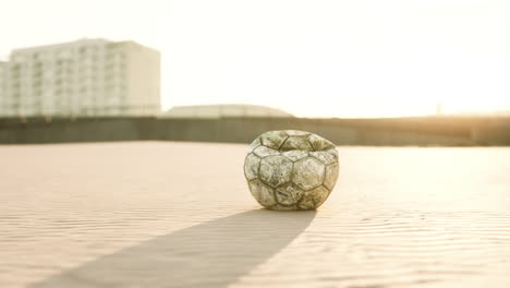 abandoned soccer ball in the desert