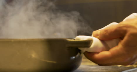 The-Cook-Cooks-Mussels-In-The-Pan-6