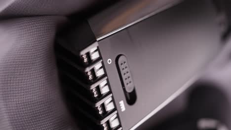 close-up of a black electric hair clipper