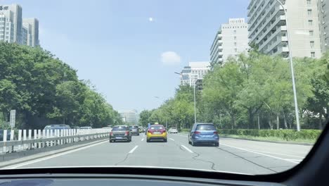 driving on a city street in china