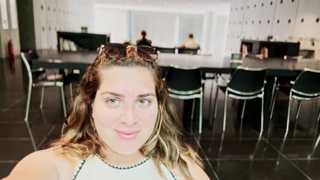 vlogger woman with a serious expression in a modern room