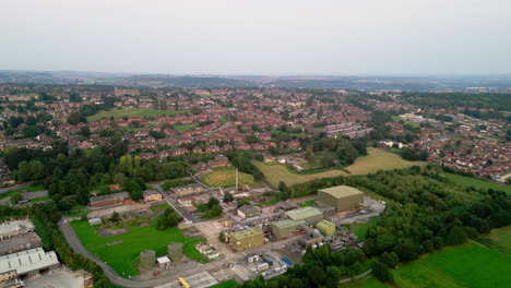 Dive-into-Dewsbury-Moore-Council-estate's-allure-through-breathtaking-drone-footage,-spotlighting-the-famous-urban-housing,-red-brick-terraced-homes,-and-the-industrial-Yorkshire-charm