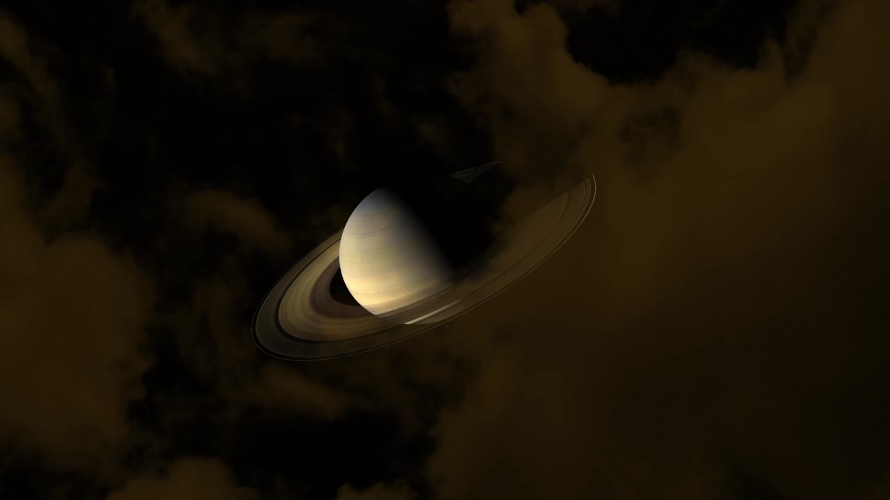 Saturn on the night sky and orange cloud moving pass