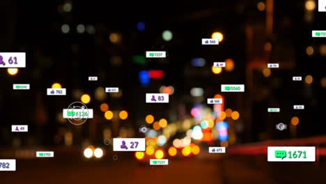 Animation-of-social-media-icons-and-numbers-over-out-of-focus-city-lights