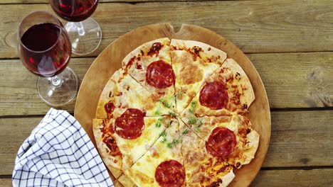 Delicious-pizza-with-a-glasses-of-red-wine