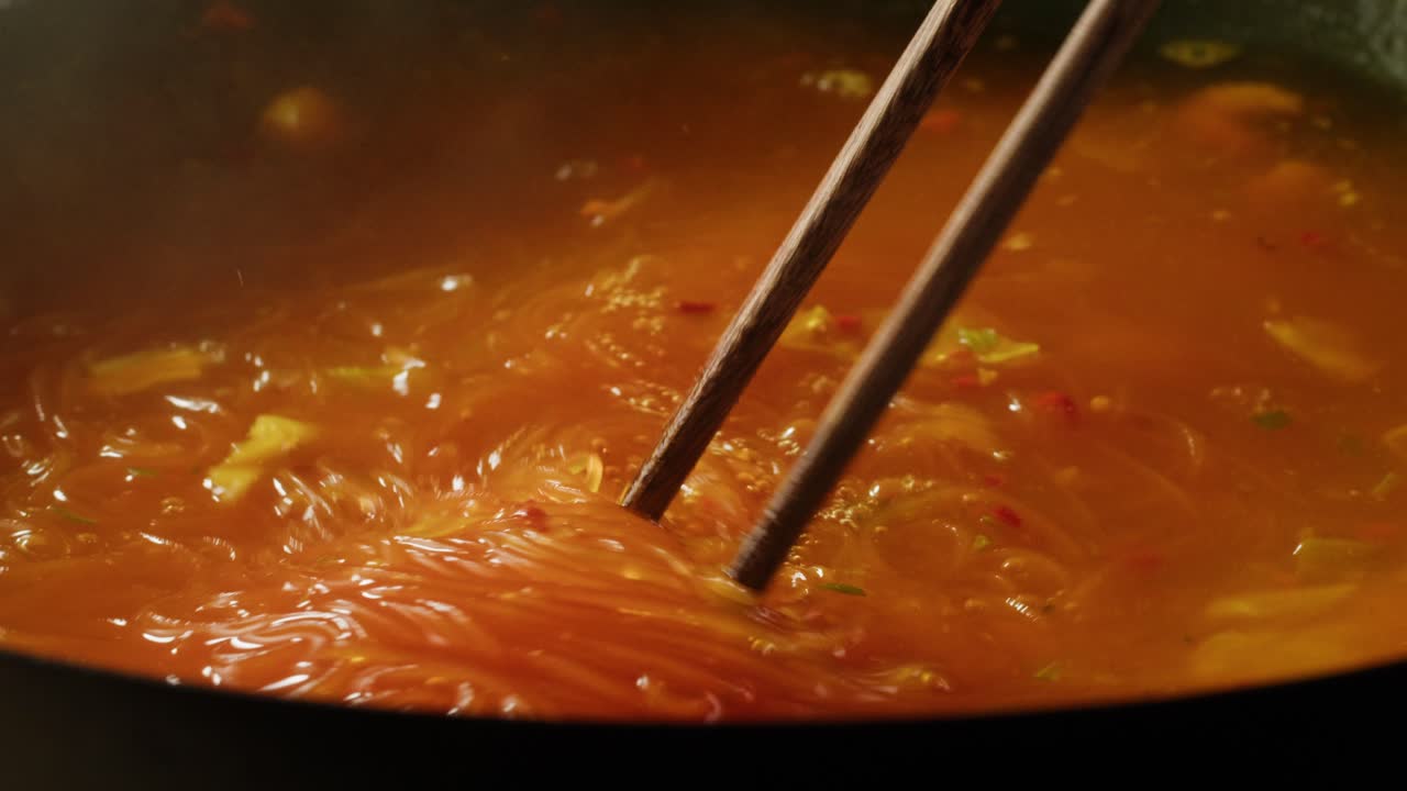 Cooking Noodles in a Spicy Soup