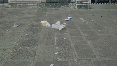 litter and garbage on a city street