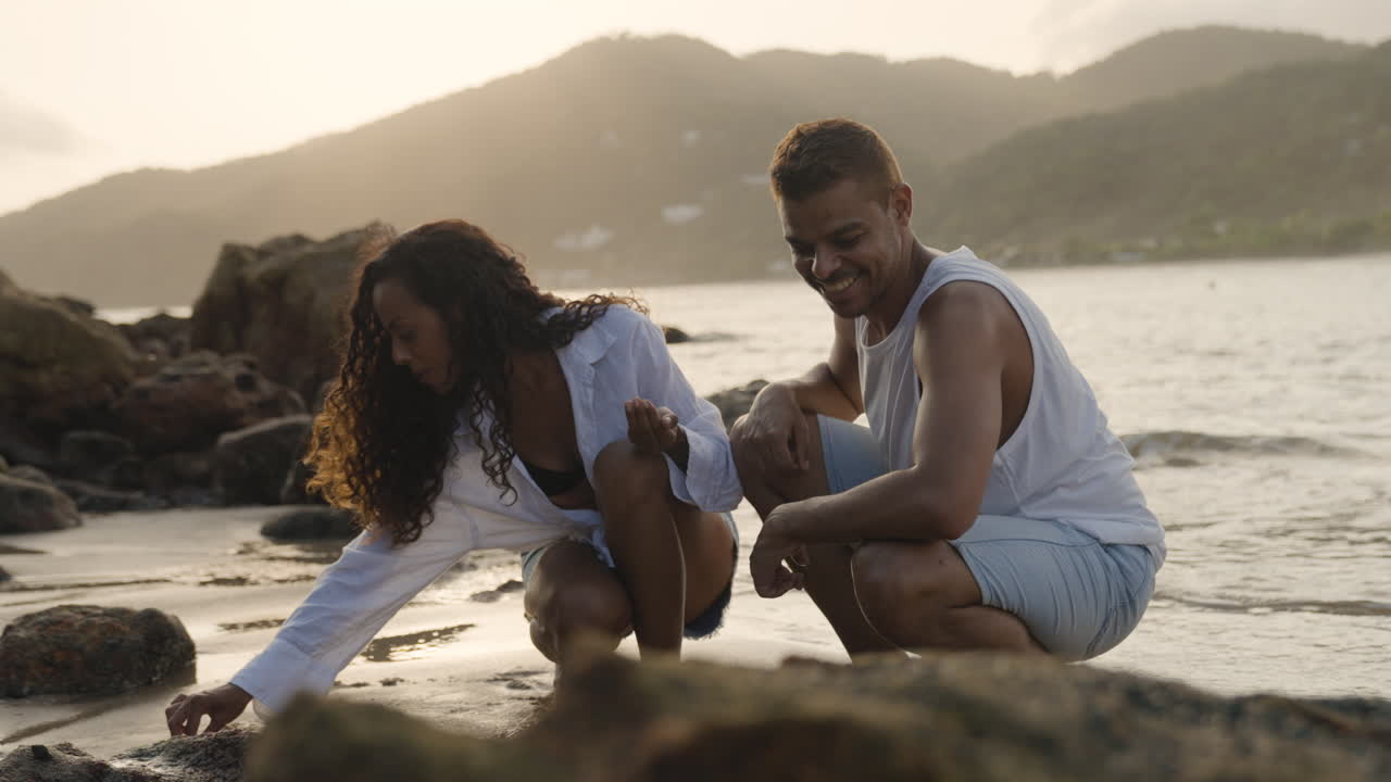 Couple at the rocky seashore