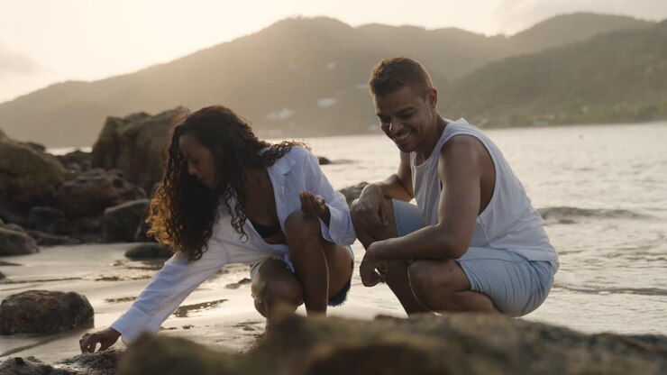 Couple at the rocky seashore
