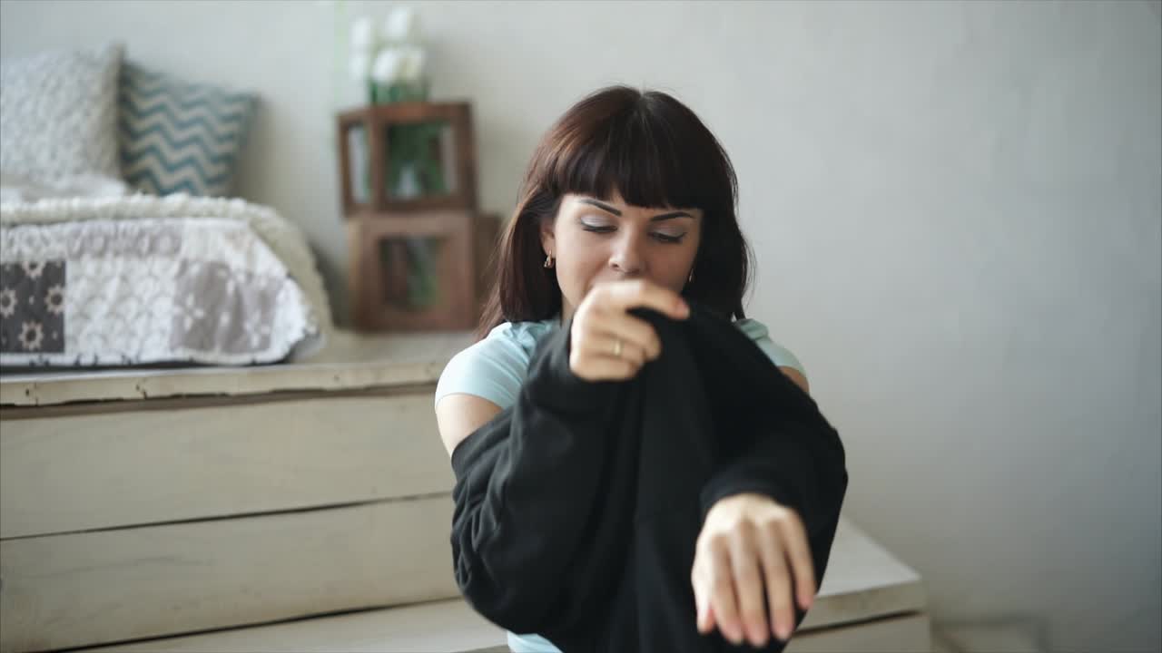 Woman Getting Dressed at Home