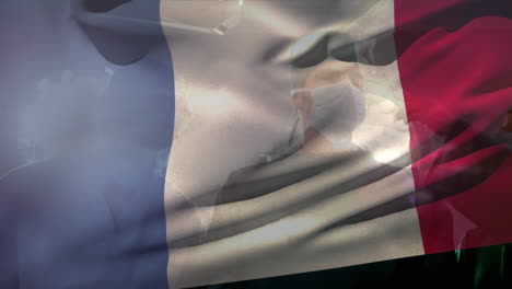animación de la bandera de francia sobre varios cirujanos con máscaras faciales durante la cirugía