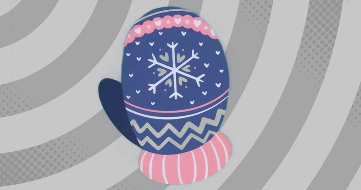 Upon playback mitten oscillating right to left revealing snowflake heart motifs on gray swirl