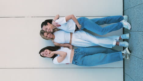 three young women posing together