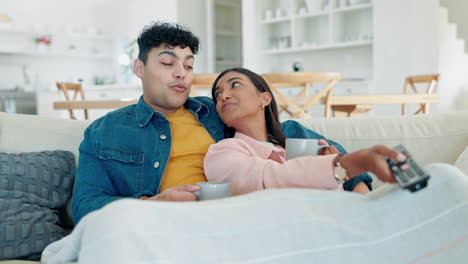 remote, couple and watching tv while talking