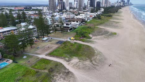 aerial view of beach, ocean, and cityscape