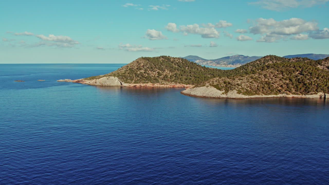 Aerial View Of Punta des Jondal Peninsula In Ibiza, Spain - drone shot