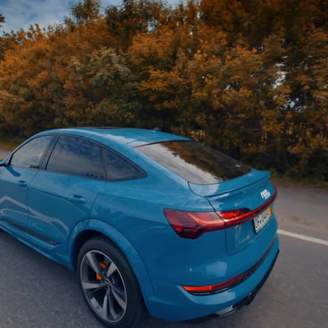 audi e-tron sportback on road. audi e-tron luxurious car exterior with elegant sport elements and expensive metallic design