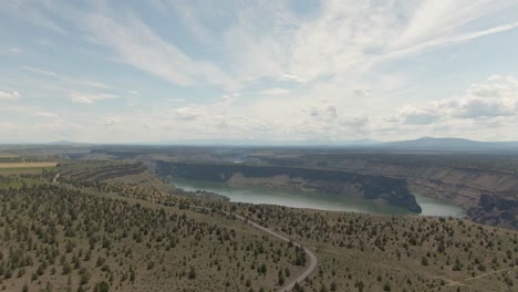 Beautiful-Aerial-View-of-The-Cove-Palisades-State-Park-during-a-cloudy-and-sunny-summer-day