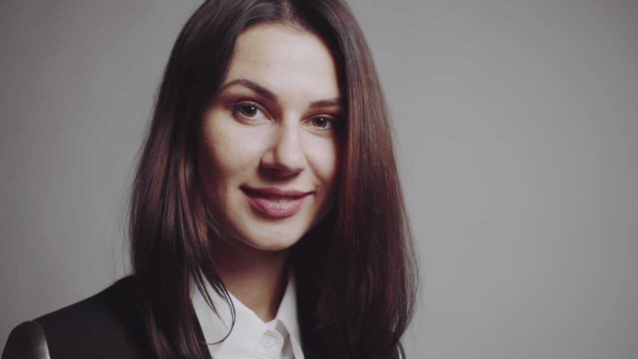 Woman posing in studio. Young fashion model girl posing in trendy wearing in studio