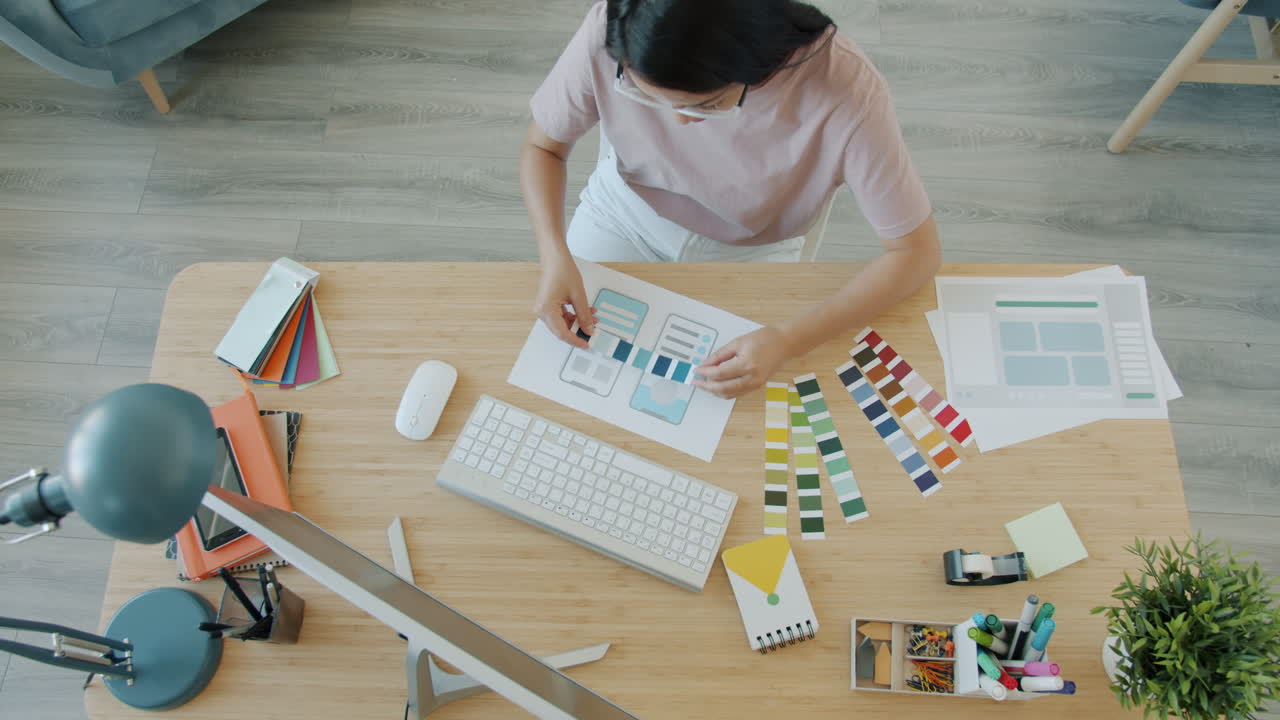 Woman Designer Working on Mobile App Design