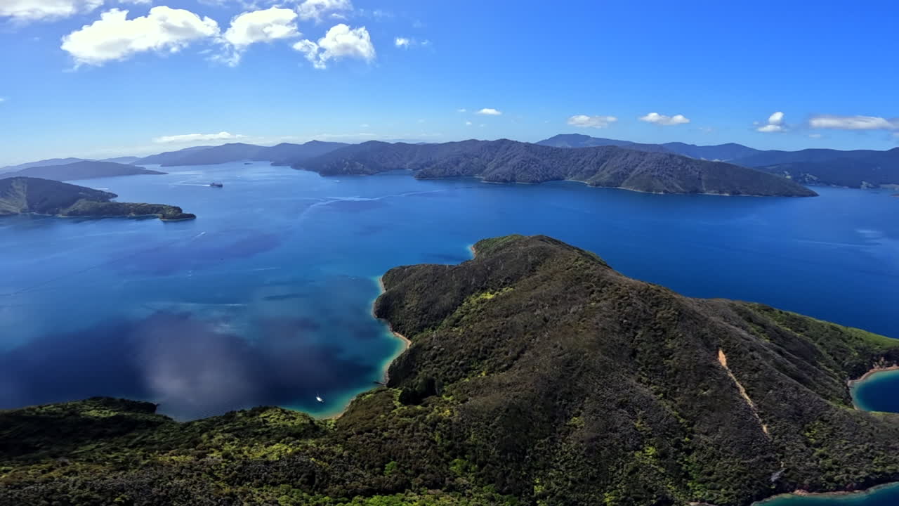 Aerial shot flying over the Marlborough sounds towards the interislander Ferry, New Zealand