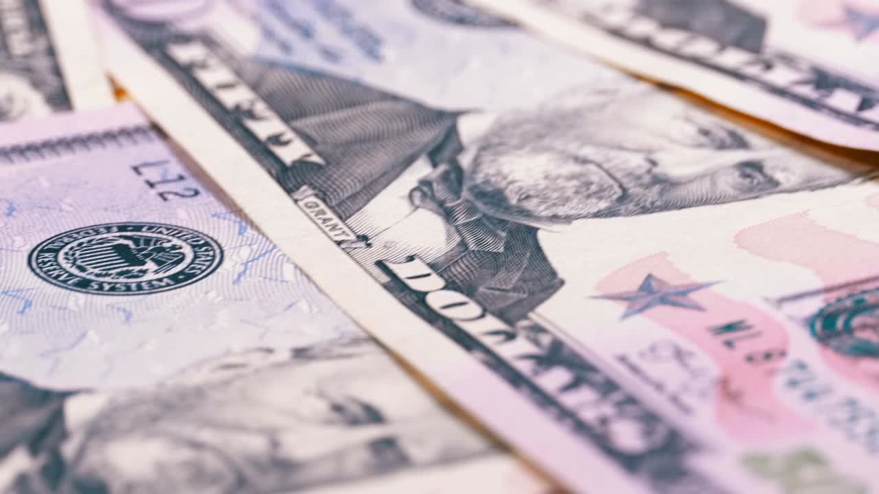 Slow Rotating Fifty Dollars American Bills. Background with money