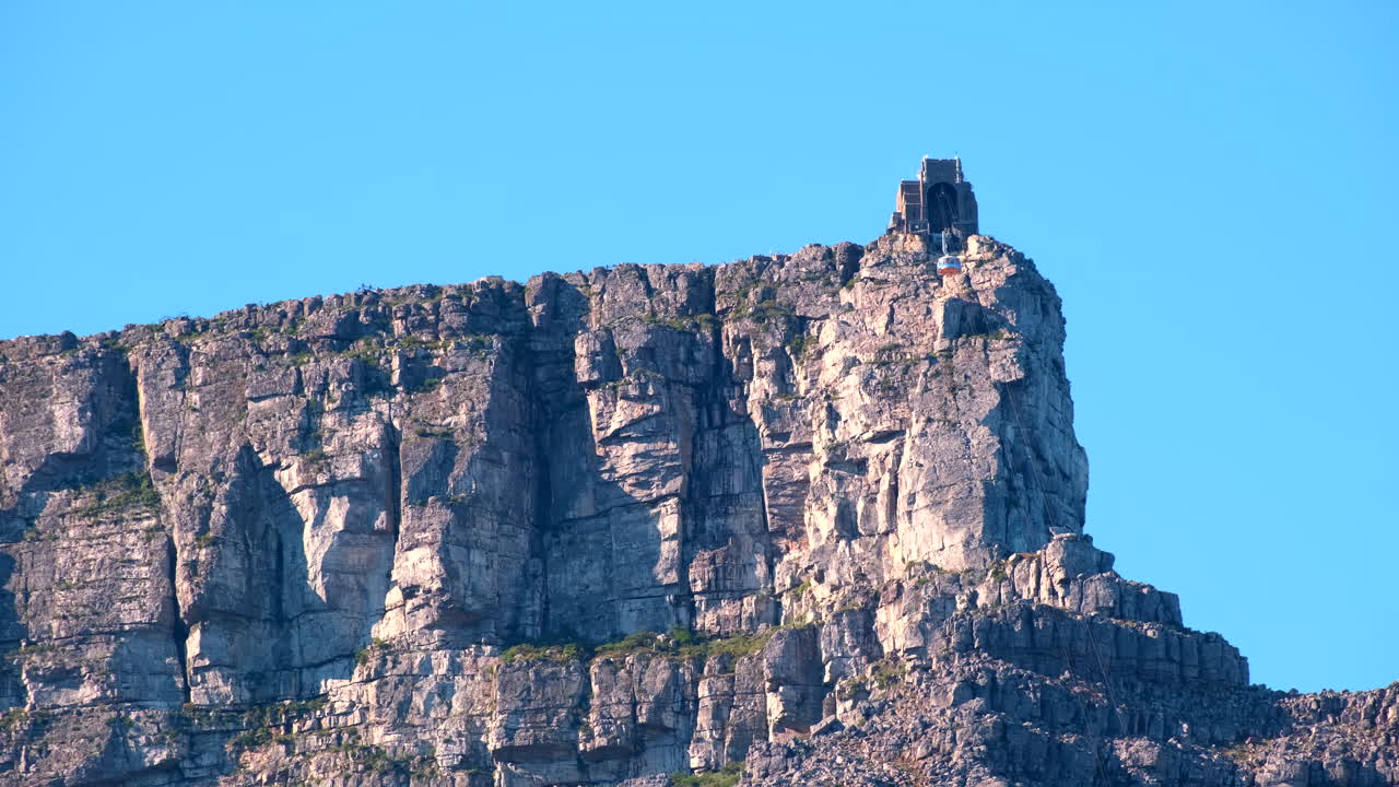 Cable car descends from upper station on Table Mountain tourist attraction