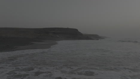 apple prores 422 coast of fuerteventura canary islands with waves and car on rock