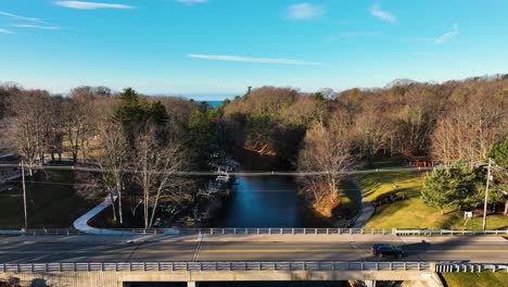 Rising-and-tilting-above-the-bridge-and-small-creek