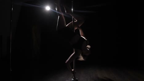 pole dance performance silhouette