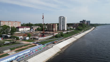 city riverfront development with construction