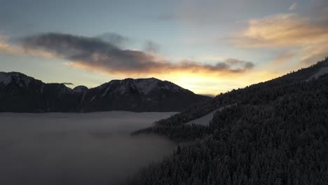impressive sunrise with a sea of clouds in the french alpes