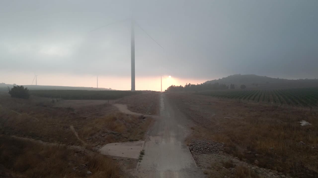Golan Heights, north Israel.  View of dirt road, landscape, and Mount Hermon in the background. The Golan Heights, Northern Israel Israel, Golan Heights, Valley of tears